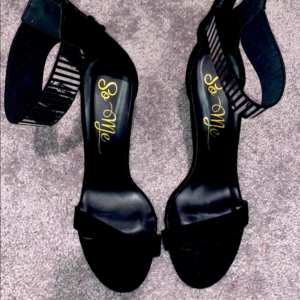 Black zip up heels